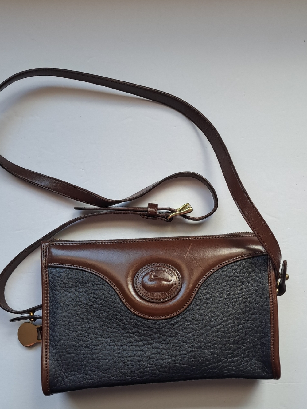 Dooney & Bourke Black Pebbled Leather Crossbody with Brown Trim